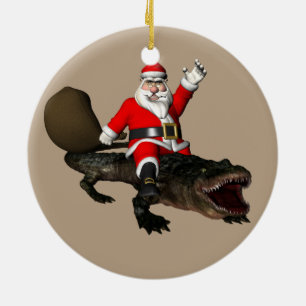 Vruchtloze kerstman die een alligator bestuurt keramisch ornament