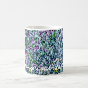 Vuilsnoeren en lila bloemen koffiemok
