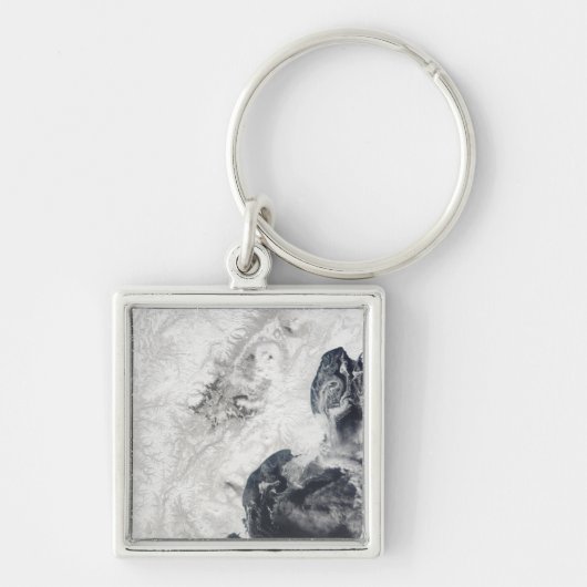 Vulkaanuitbarstingen in het centrum van het schier sleutelhanger (Voorkant)