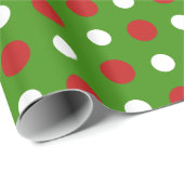 Vun kerstpokadots in de rode en witte omhulling cadeaupapier (Rol Hoek)