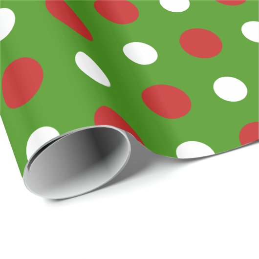 Vun kerstpokadots in de rode en witte omhulling cadeaupapier (Rol Hoek)