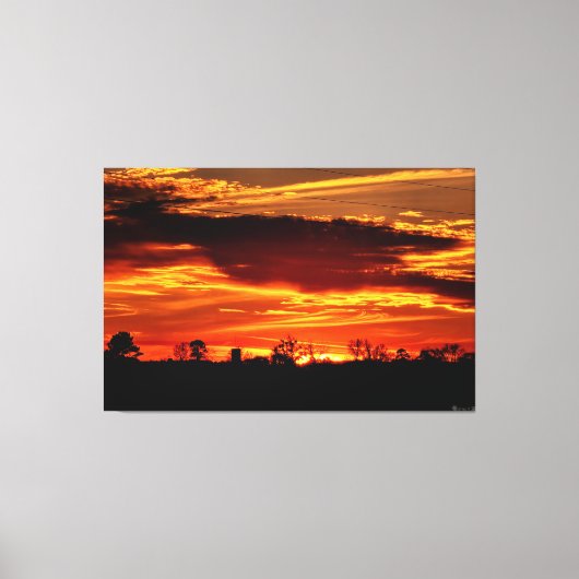 Vurig Zonsondergang Boven Silhouet van Bomen Canvas Afdruk (Voorkant)