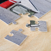 Vuurman die in de brandwagen klimt legpuzzel (Zijkant)