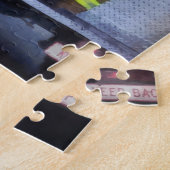 Vuurman op de achterkant van de brandwagen legpuzzel (Zijkant)