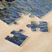 Vuurtoren aan de kust van het meer legpuzzel (Zijkant)