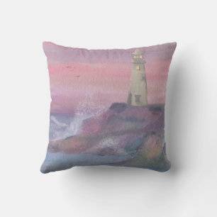 Vuurtoren aan de kustklif met roze lucht kussen