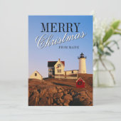 Vuurtoren bij zonsondergang met kerstdecoraties feestdagenkaart (Staand voorkant)