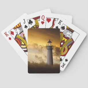 Vuurtoren gloeien onder Dramatische hemel Pokerkaarten