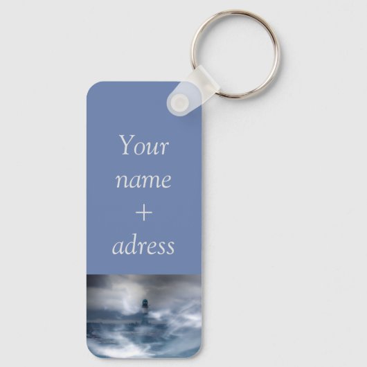 vuurtoren in de storm - Sleutelhanger van het Oost (Achterkant)