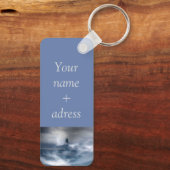 vuurtoren in de storm - Sleutelhanger van het Oost (Achterkant)