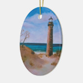 vuurtoren met klein verkooppunt keramisch ornament (Links)