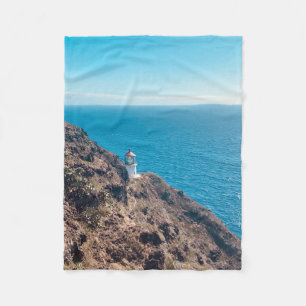 vuurtoren op de rotsblauwe oceaan Hawaii Fleece Deken