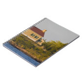 vuurtoren op het superieure meer nabij de kopperha notitieboek (Linkerzijde)