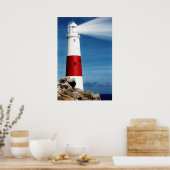 vuurtoren op rotsen met lichte balken poster (Keuken)