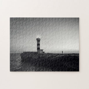 vuurtoren op zonsondergang legpuzzel