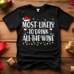 Waarschijnlijk DRINK U ALLE WIJNKERST T-shirt<br><div class="desc">Grappige volwassen bijpassende familie T-shirts. Draag met Kerstmis, Kerstfeest, of geef als cadeau. Unisex T-shirt. Hoogwaardige t - shirts worden geleverd in uw keuze van verschillende "Most Likely To"-gezegden. De meeste kans om kerstfilms C te kijken - de meeste kans om alle koekjes D te eten - de meeste kans...</div>