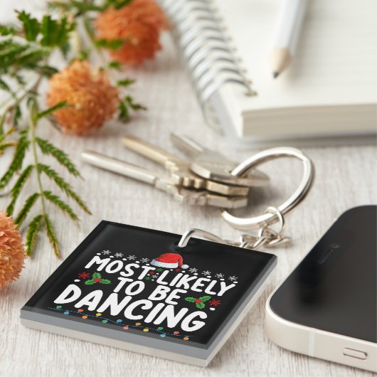 Waarschijnlijk is het een dansende kerstfamilie sleutelhanger (Voorkant Rechts)