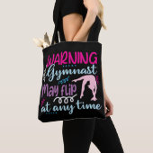 Waarschuwing Gymnast kan op elk moment omdraaien Tote Bag (Dichtbij)