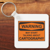 Waarschuwing kan beginnen met praten over cartogra sleutelhanger (Voorkant)