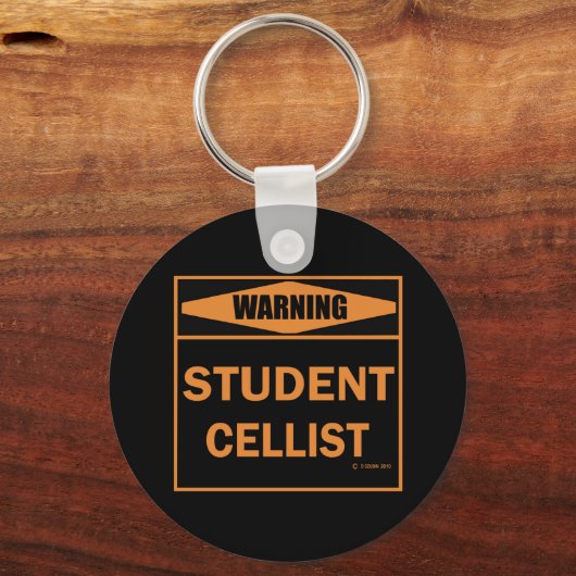 Waarschuwing! Student Cellist. Sleutelhanger (Achterkant)
