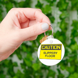 Waarschuwingsbord gladde vloer sleutelhanger
