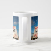 waarschuwingsbord nabij de luchthaven van Sint Maa Grote Koffiekop (Achterkant)