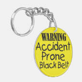 Waarschuwingsongevallenprothese zwarte gordel sleutelhanger (Voorkant Links)