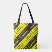 waarschuwingsteken bij constructie tote bag (Achterkant)