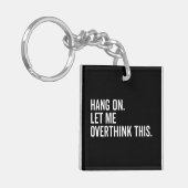 Wacht even. Laat me dit overdenken. Sleutelhanger (Voorkant Links)
