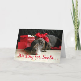 wachten op santa pointer en giften bij fireplace feestdagen kaart