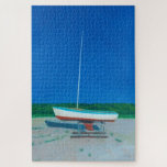 Waiting for Launch 1014pc Puzzle Legpuzzel<br><div class="desc">A painting of a single sailboat in a boat yard on a late spring day with a deep blue sky in the background. The artwork is about waiting for summer to start in New England and the fun on the water that comes with living in a coastal town.</div>