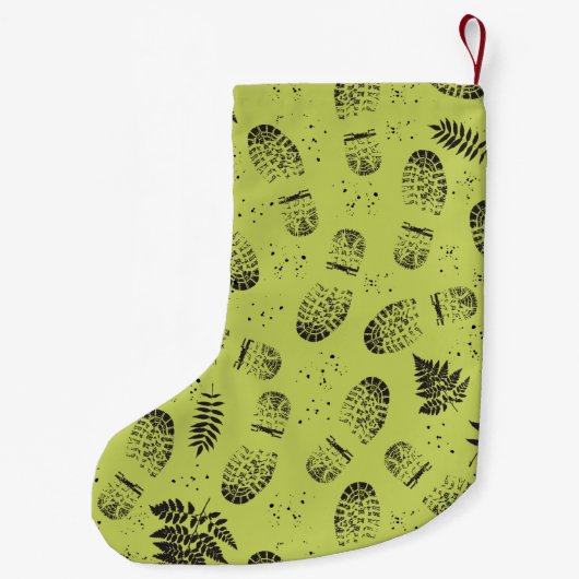 Wandelboot modderige voetafdrukken buitenshuis lie kleine kerstsok (Achterkant)