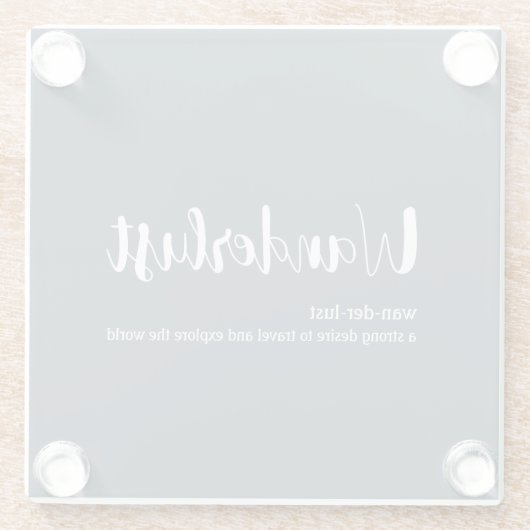 Wanderlust-definitie witte grijze blauwe kleur glazen onderzetter (Achterkant)