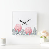 Wandklok met charmante, delicate bloemen. (Huis)