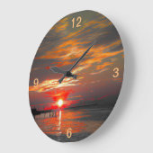 Wandklok met prachtige uitgegeven zonsondergang (Hoek)