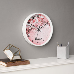 Wandklok met roze roos en wervelingen ontwerp