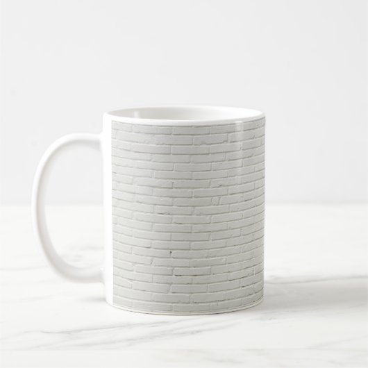 Wandstenen met witte baksteen koffiemok (Links)