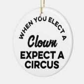 Wanneer u een Kast kiest Verwacht een Circus Keramisch Ornament (Links)
