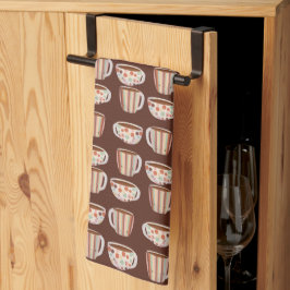 Warm cirkelpatroon op kopjes koffie theedoek