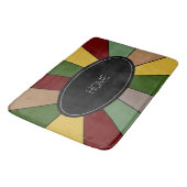 Warm kleurig mozaïekontwerp op zwart badmat (Gekanteld)