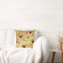 Warme chocolade en suikerriet op faux golden kussen