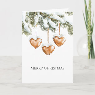 Warme romige karamelharten kerstboomtakken kaart