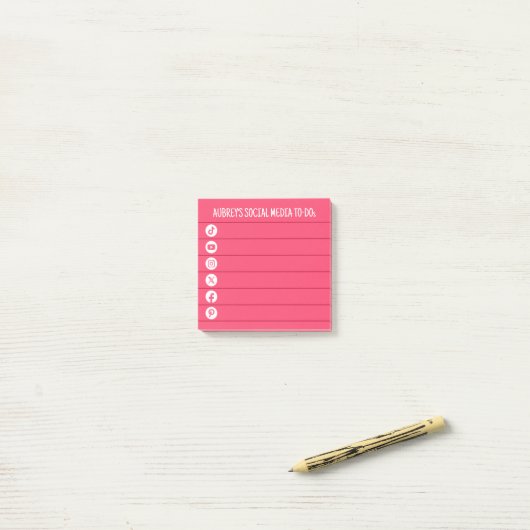 Warme roze en witte social media to do lijst post-it® notes (Op bureau)