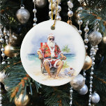 Warmste Wensen Kerstman aan het strand Keramisch Ornament<br><div class="desc">Dit ontwerp werd gecreeerd door digitale kunst. Het kan op het gebied worden gepersonaliseerd dat door de foto en/of de tekst te veranderen wordt verstrekt. Of het kan worden aangepast door de klik te kiezen om de andere optie aan te passen en de kleur op de achtergrond te verwijderen of...</div>