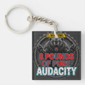 Warning 8 Pounds of Pure Audacity Sleutelhanger (voorkant)