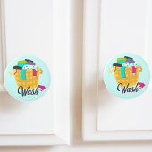 Wasmand vol met kleding keramische knop