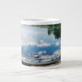 Water | Canoe on Lake in Sweden Grote Koffiekop (Voorkant)