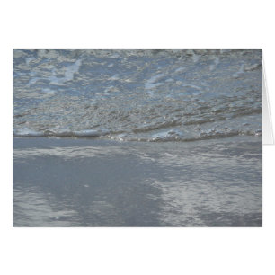 Water dat op het strand kabbelt Abstracte fotograf