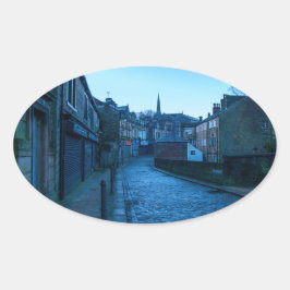 Water Street Todmorden - Cobbled Charm at Dusk Ovale Sticker