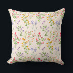 Watercolor Wildflower Botanical Pattern Kussen<br><div class="desc">Soft watercolor wildflower throw pillow featuring a delicate botanical pattern with colorful hand-painted flowers and leaves on a neutral background. This decorative pillow brings a fresh spring garden feel to any living room, bedroom, sofa, or cozy space. Perfect for nature lovers, cottagecore decor, botanical interiors, and soft floral home styling....</div>